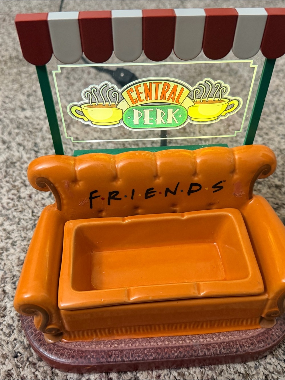 Scentsy Orange Central Perk Couch Wax Warmer Accessory with Red and Green Sign
